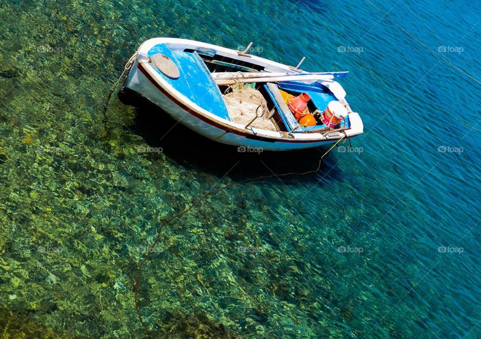 Small boat on sea water