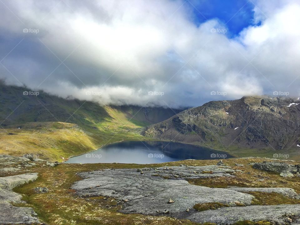 Cloud reflecting on lake