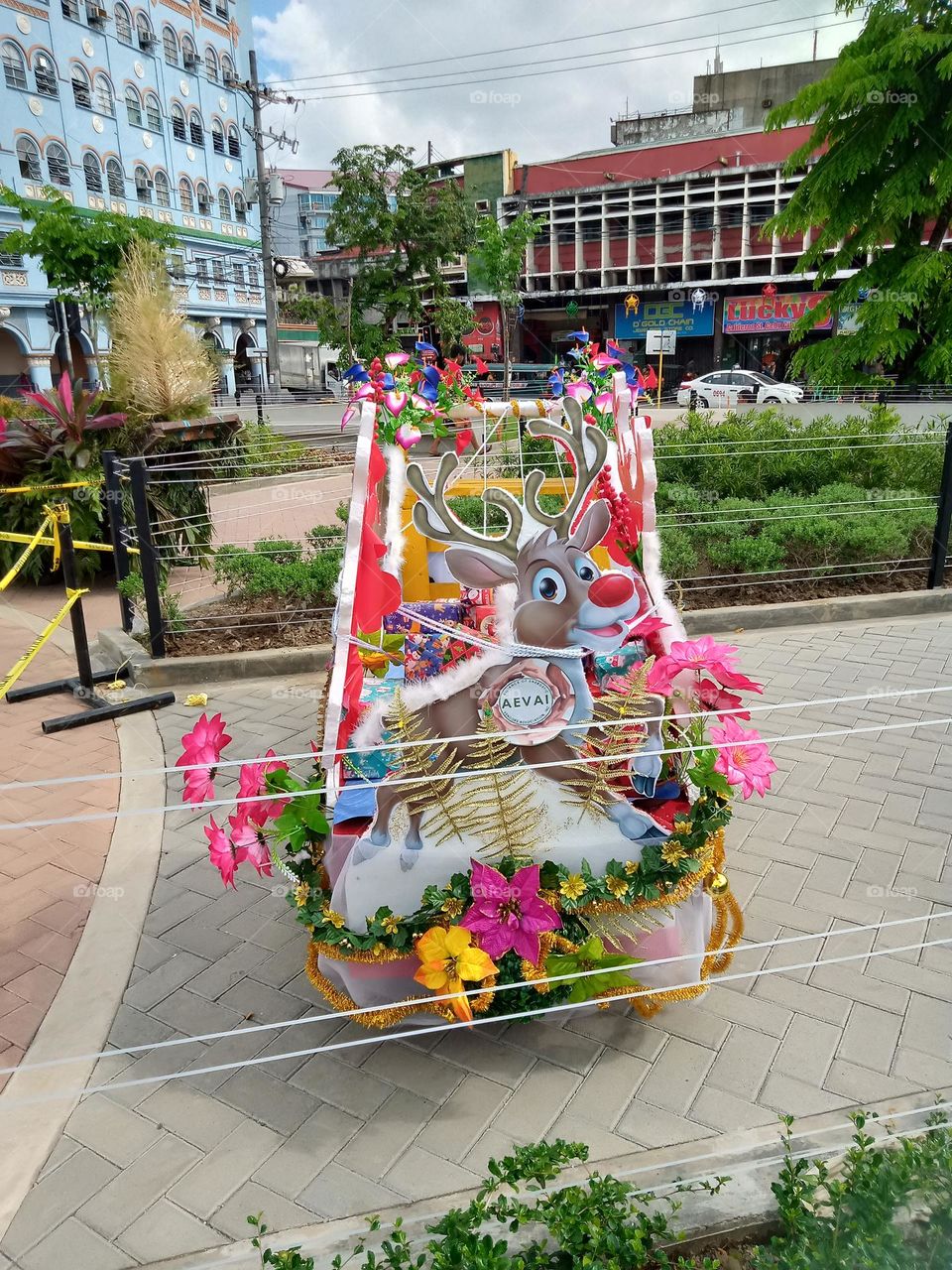 THIS WAS A VEGETABLE CART USED BY PORTERS  CONVERTED INTO A BEAUTIFUL CHRISTMAS CART AS DISPLAYED AT FREEDOM PARK