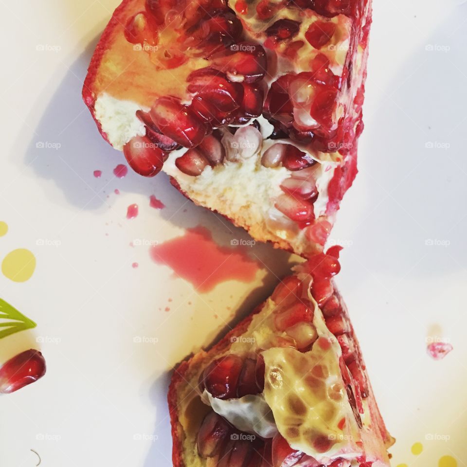 Cracked open pomegranate 