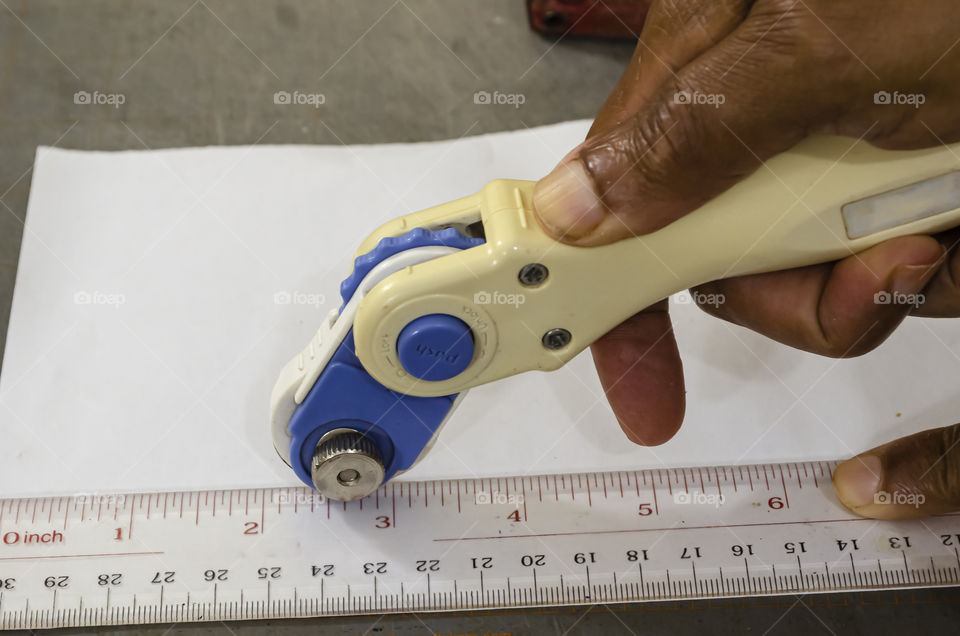 Using Adjustable Hand Held Rotary Trimmer (Lighting: Artificial)