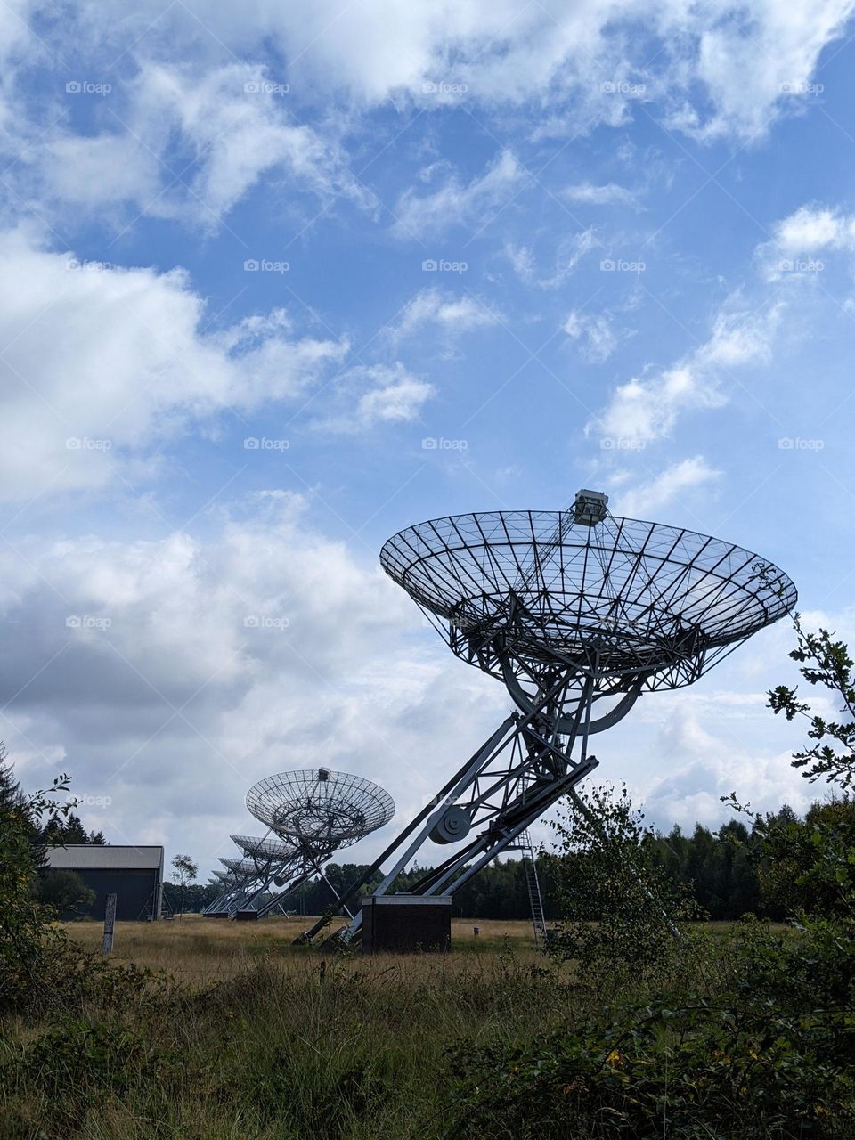 A radio telescope with several dish antennas.