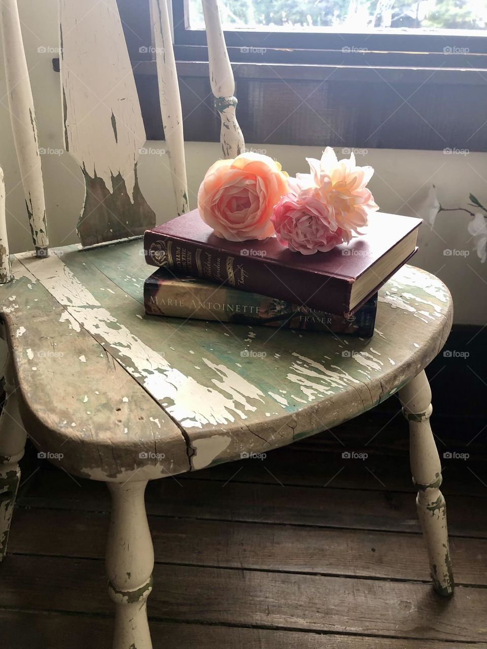 Books on a vintage chair 