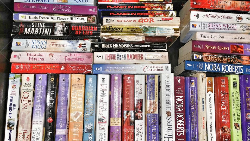 books on top of books