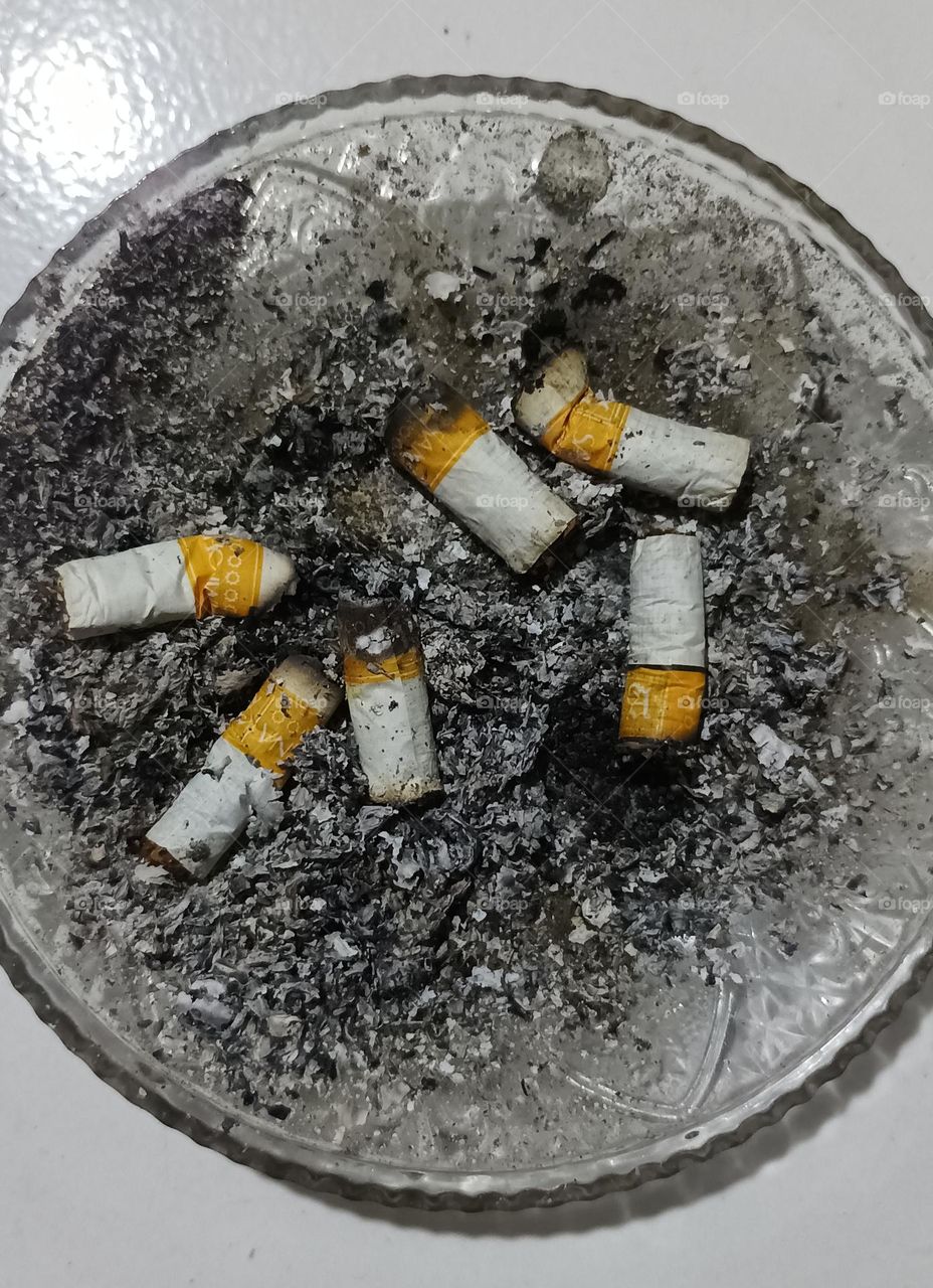cigarette butts and ashes