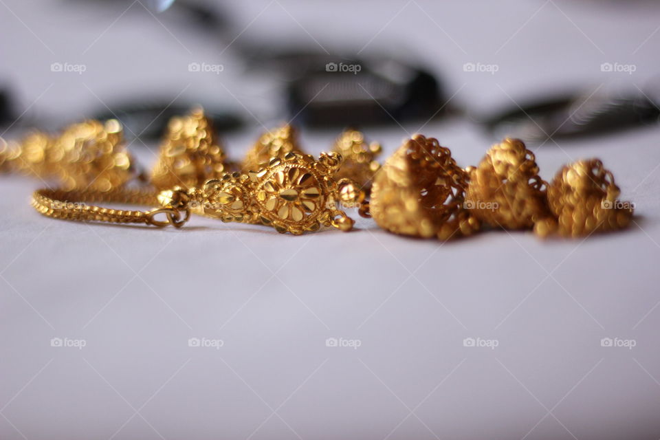 Close-up of gold jewellery