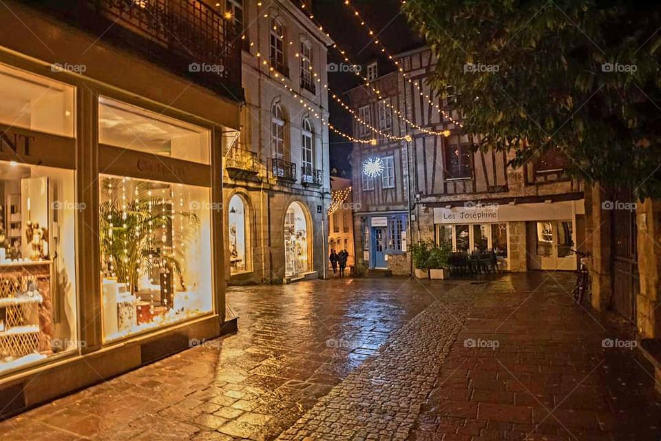 Illuminated window displays of retail shops in Vannes at Christmas time