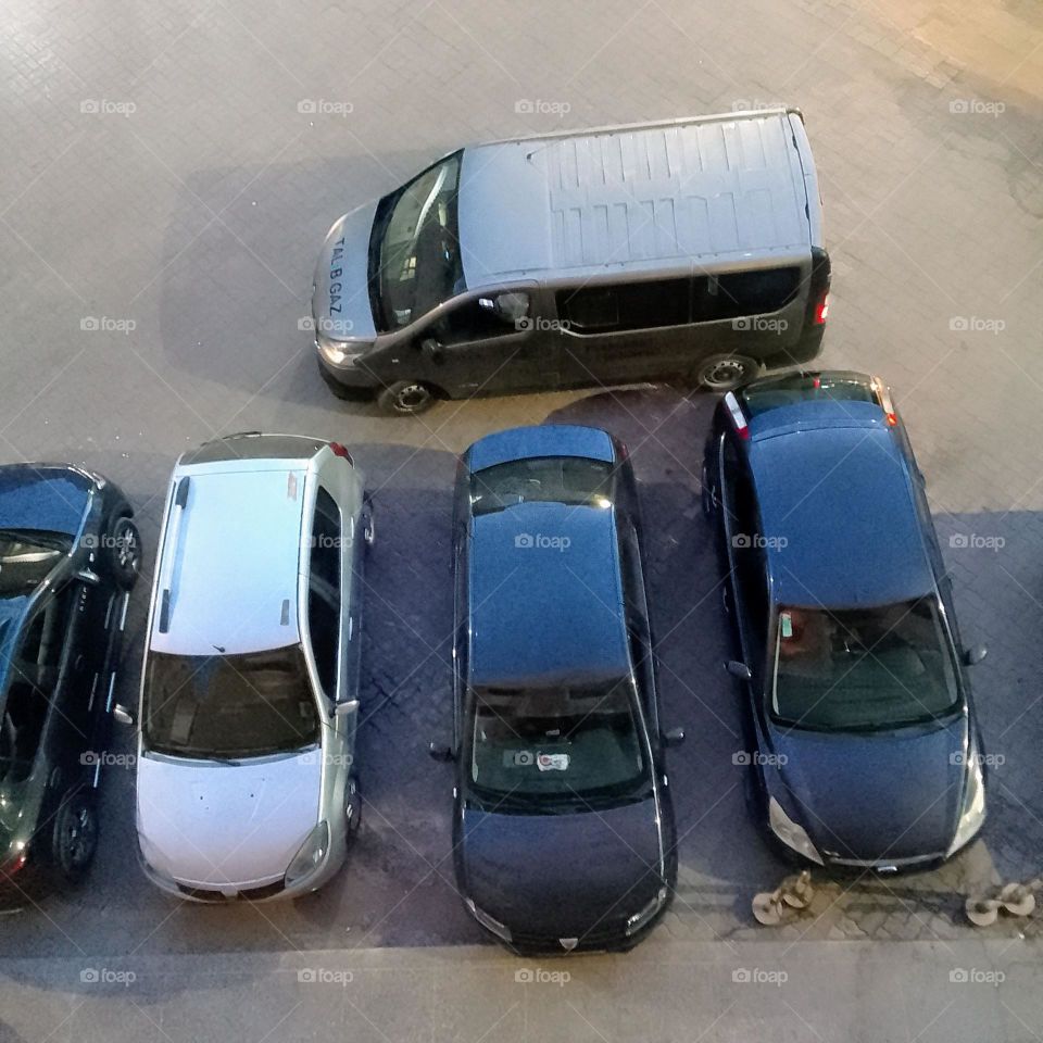 five cars in the street