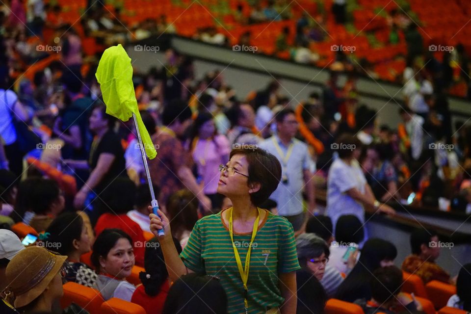 tour leader give sign to her buddies