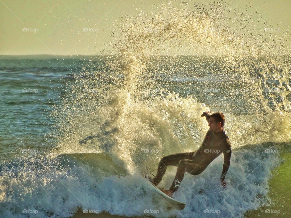 Awesome Surfer Kicking Up Epic Spray. Epic Surfing
