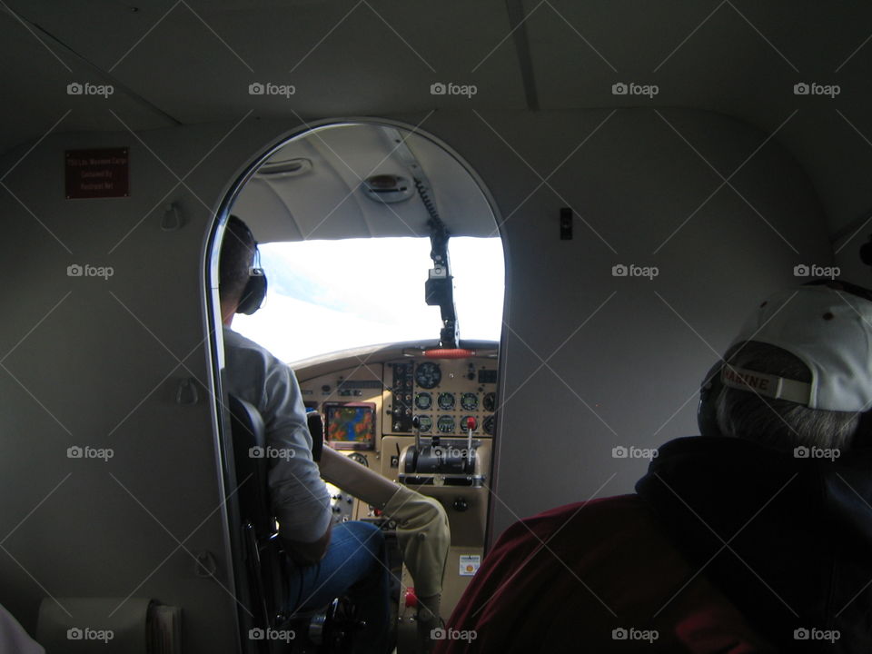float airplane cockpit and pilot ready for flight