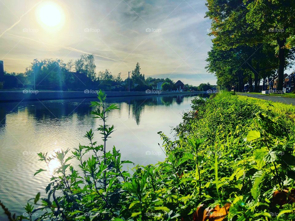 Foggy morning sunrise over the water