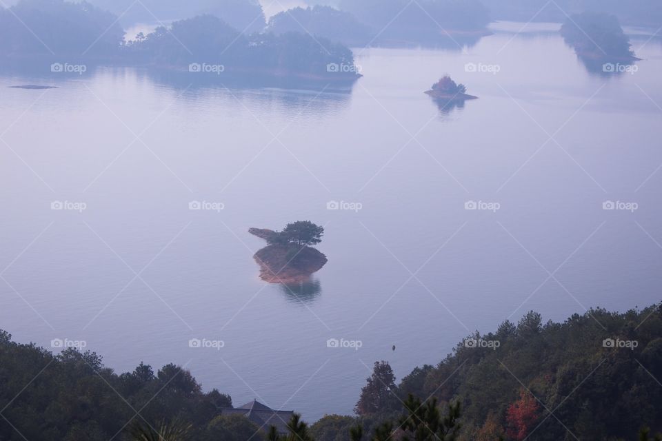 Scenic lake in fog