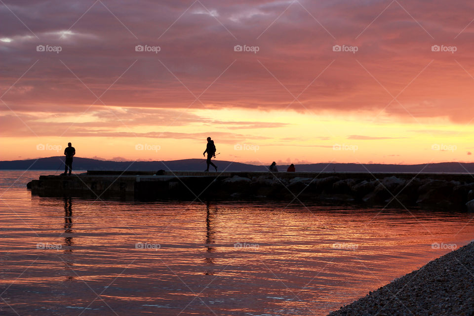 Fishing in sunset