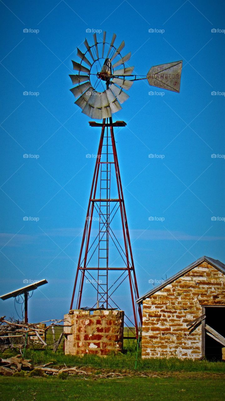 Old Majestic Windmill and New Solar Water Well at an Old Homestead 