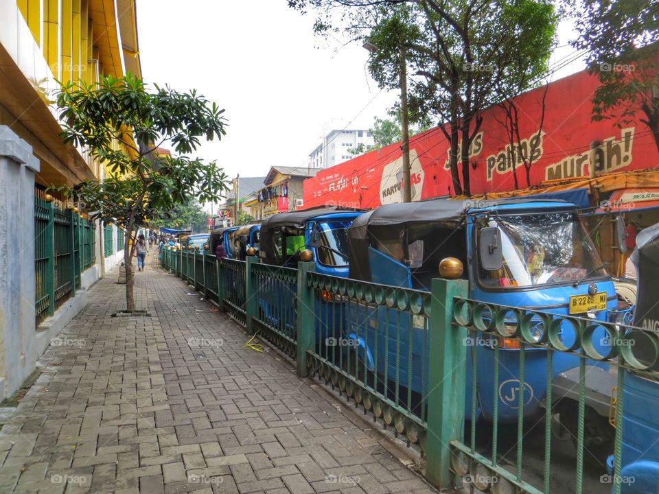 Bajaj stop outside Gondangdia Station, Jakarta