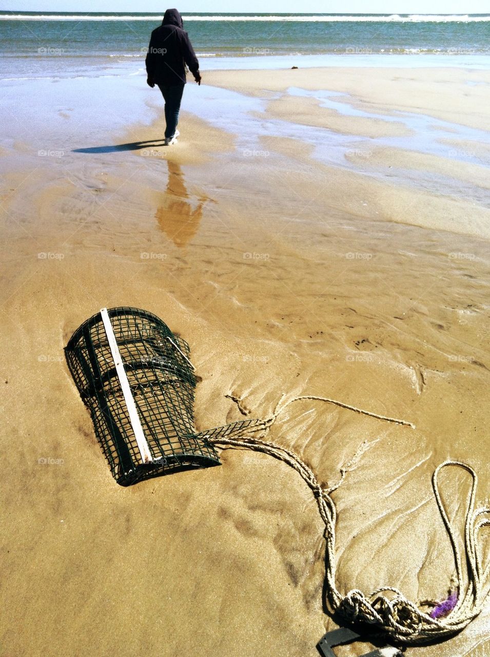 Beach with lobster trap