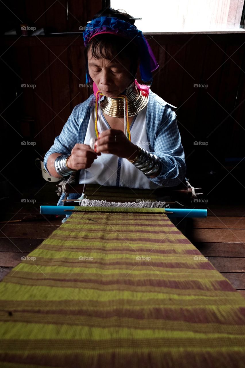 Silk weaving of a padaung woman