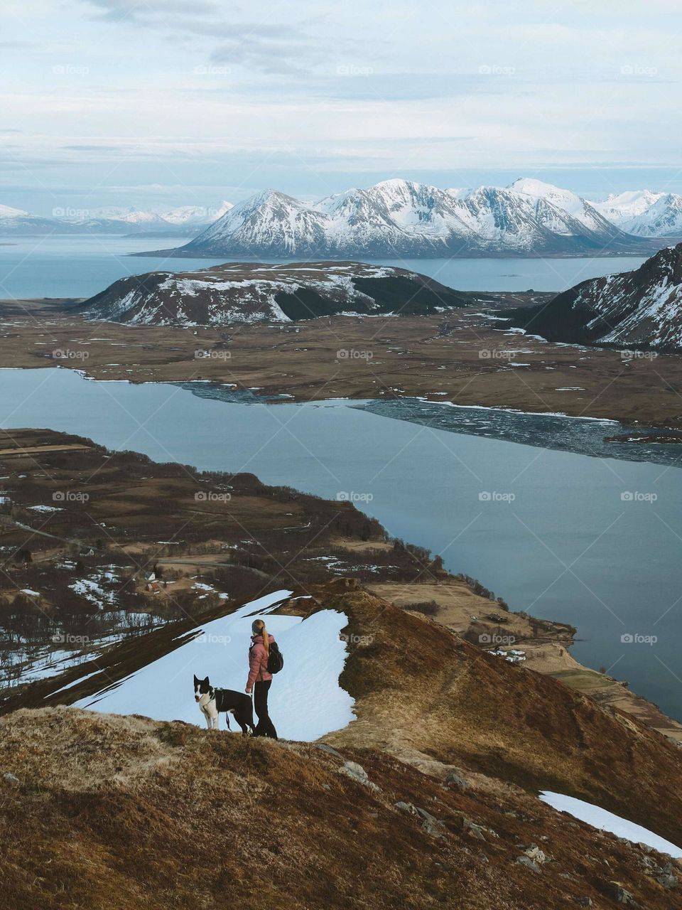 woman hiking husky dog