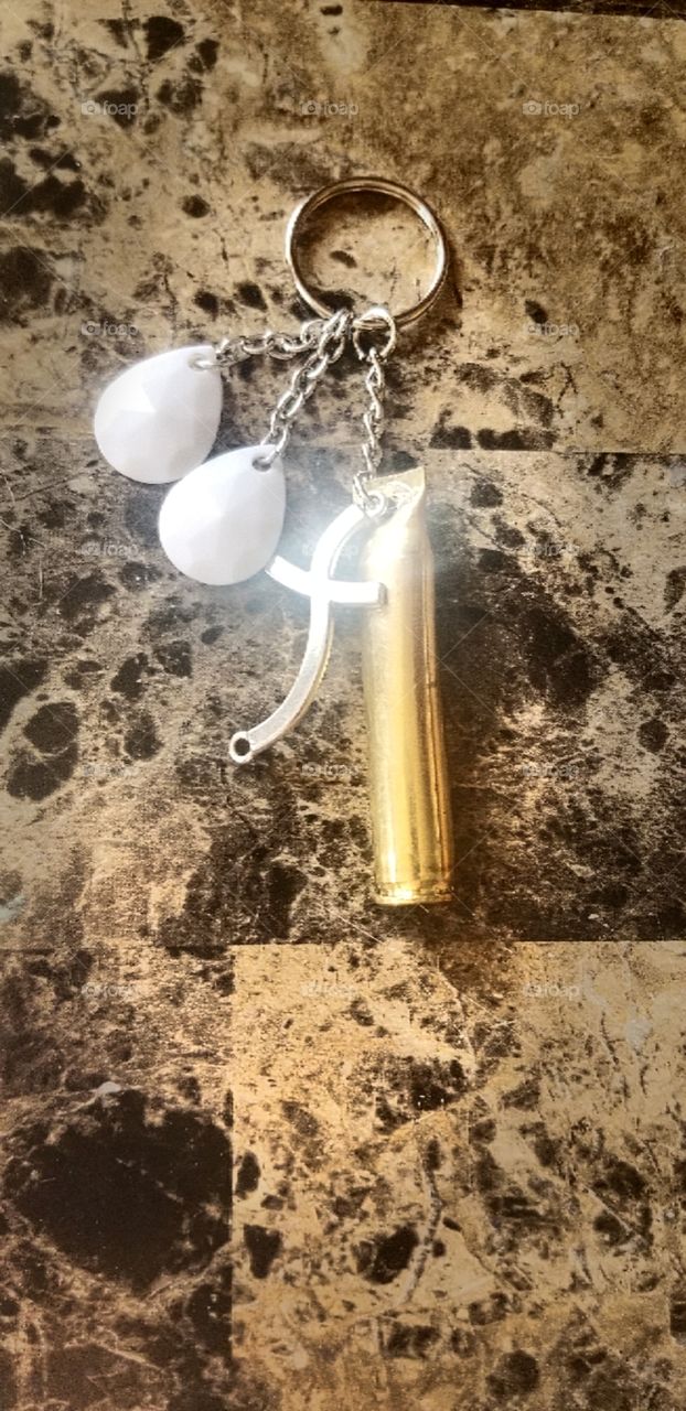 my handmade, spent bullet keychains with crosses