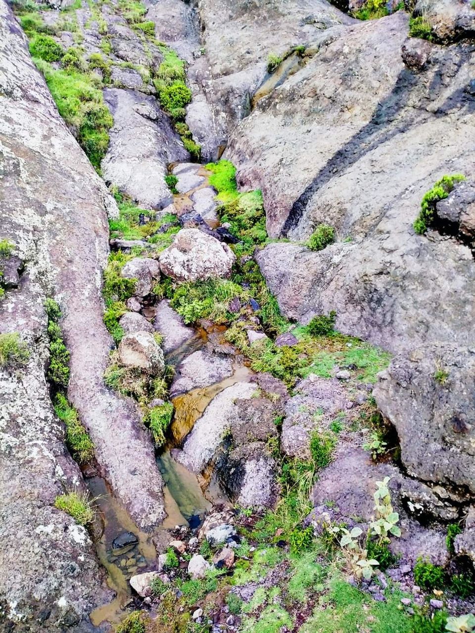 Glory be to God, the magnificent and picturesque view and the natural green trees are a view that is nothing more wonderful than it