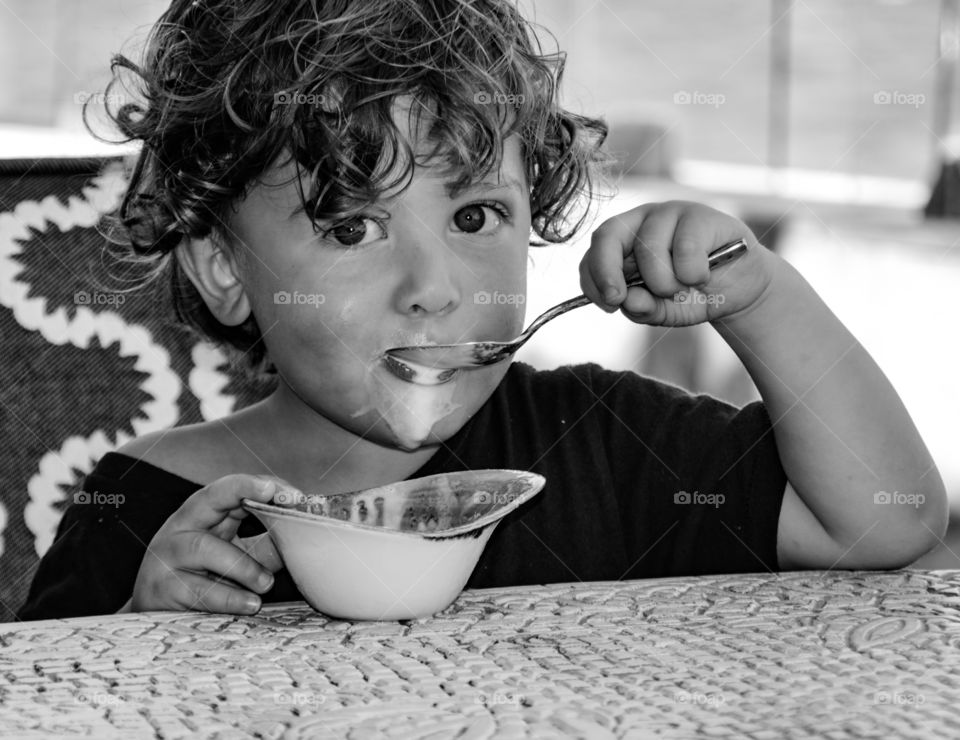 Close-up of a boy eating