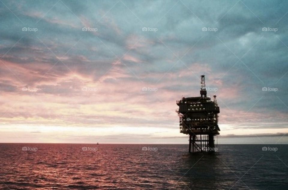 Oil Rig At Sunset