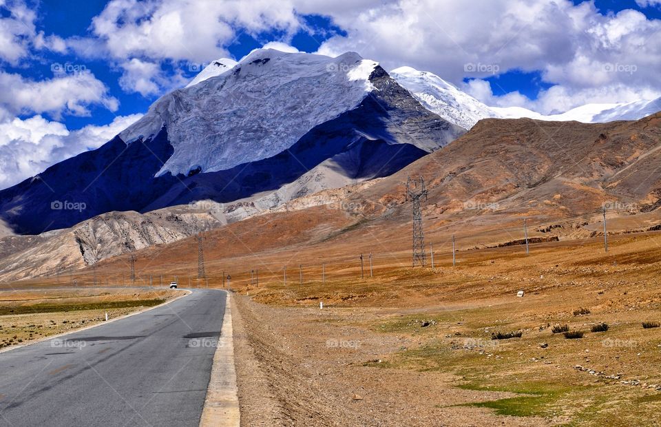 road trip in Tibet - snow peak Himalayan mountains view