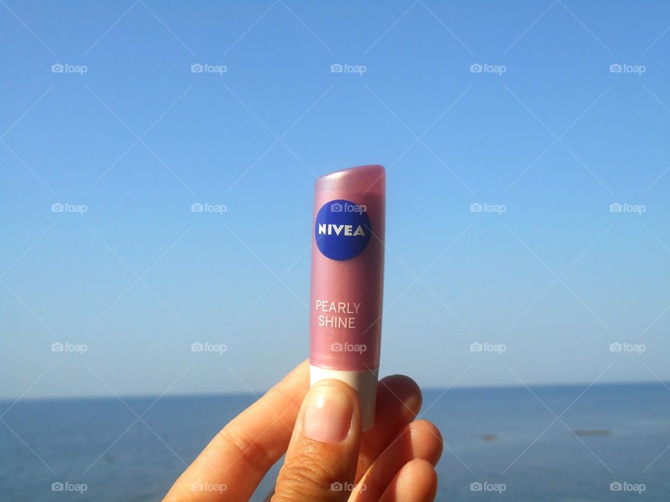 lipstick 💄 Nivea product in the hand