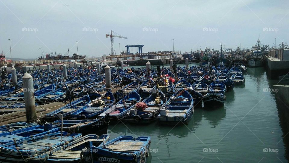 Beautiful blue boats in harbour at essaouira city in Morocco.