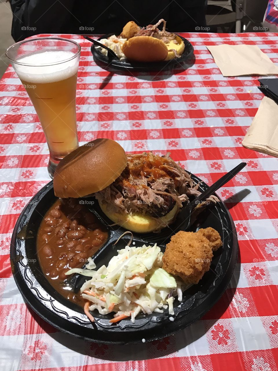 You’re perfect. Pulled pork, baked beans, coleslaw, hush puppy, and a beer. Delicious.