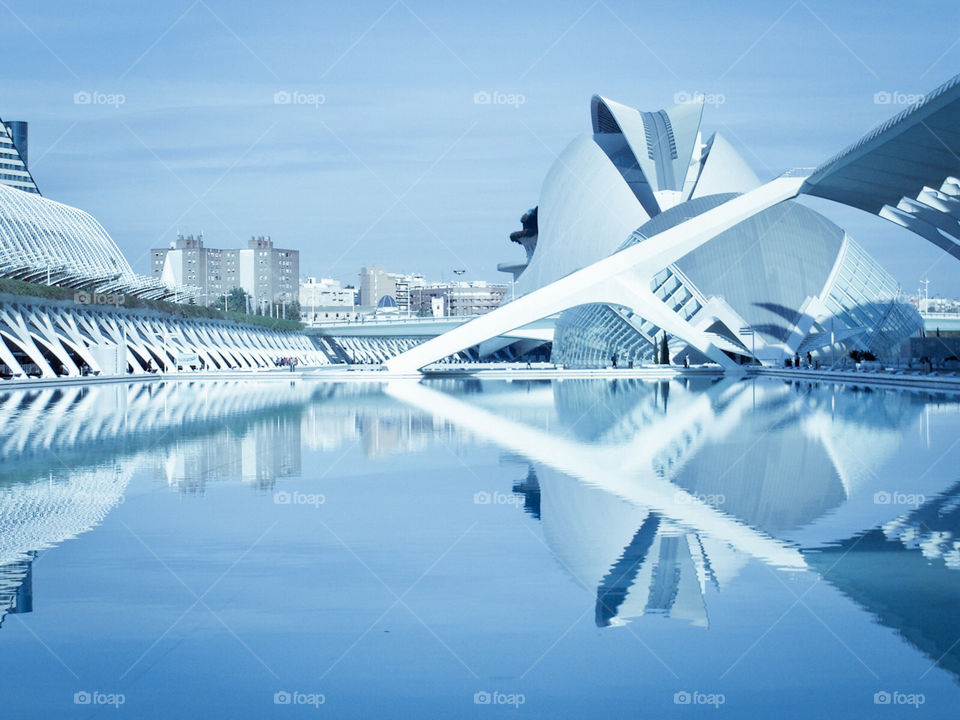 Expo Valencia . White architecture building reflecting in the water . 