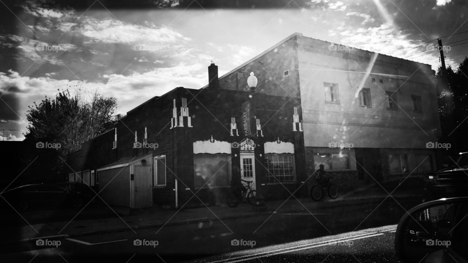 The white painted shapes on this building look like characters in an Atari game 