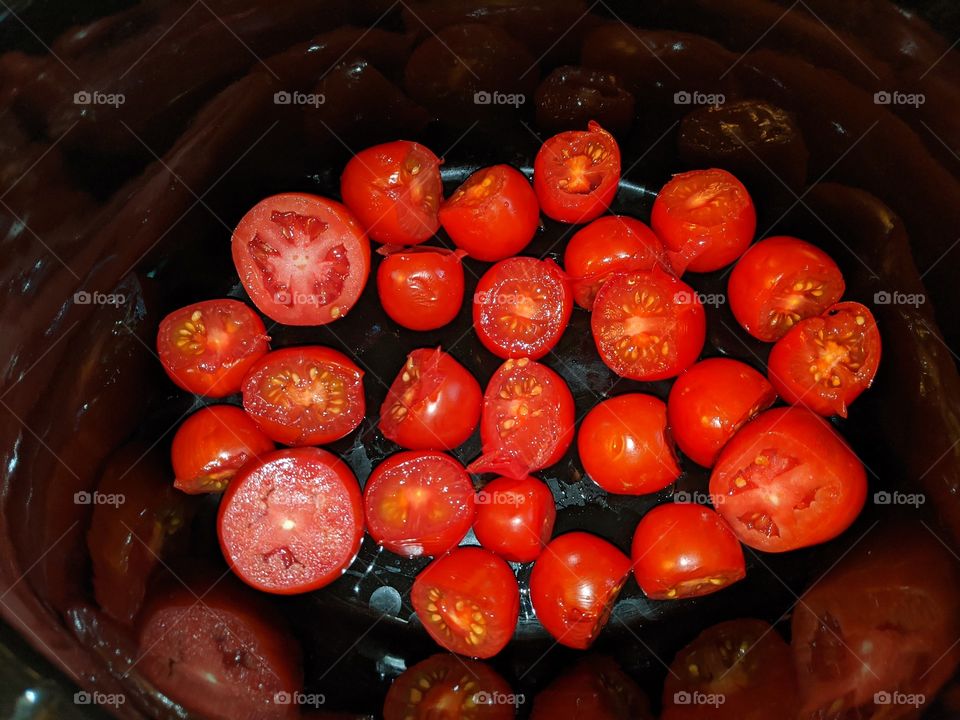 Silly Red Tomato face in a cut red tomato