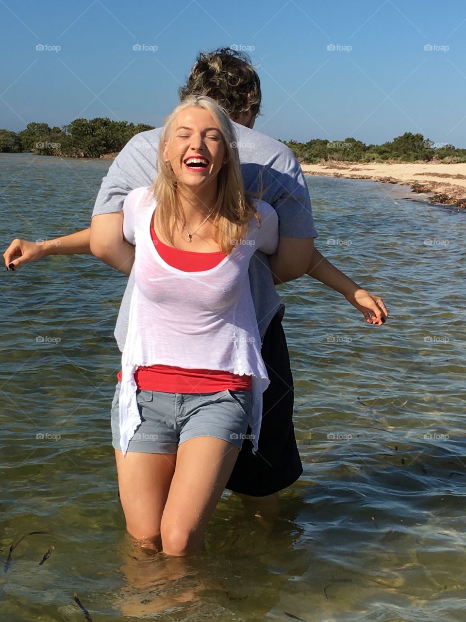 Couple enjoying at lake