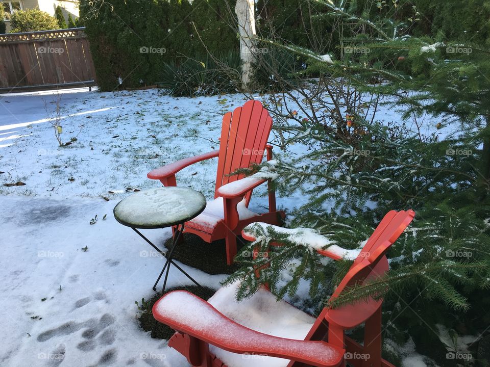 Red chairs on a winter day