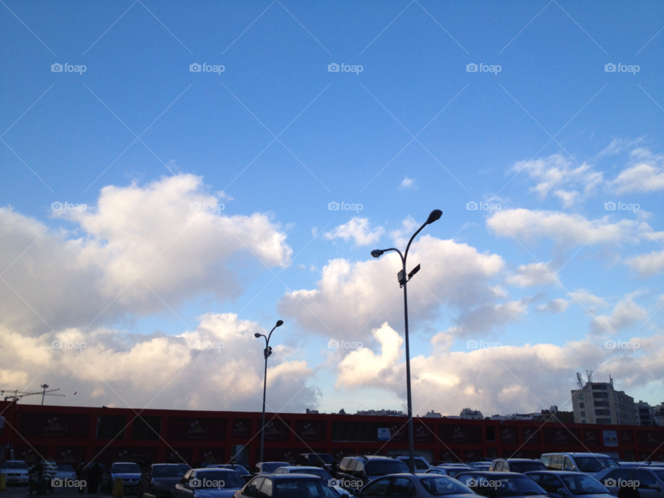 sky car blue clouds by a.bilbaisi