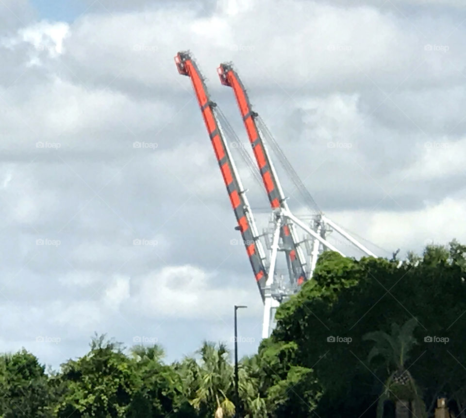 Pair of orange industrial cranes