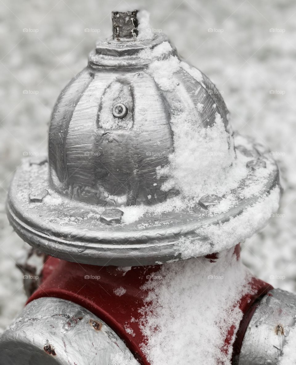 Fresh snow on ( taken with faded filter) of  Fire hydrant 