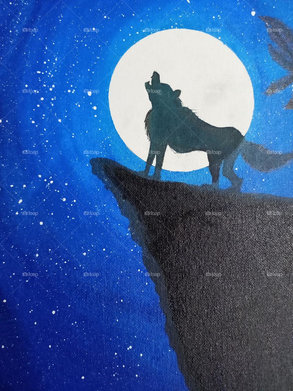 wolf standing on the peak of the cliff in moonlight with nice colourful background with moon landscape art closeup photo