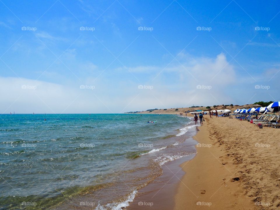 Issos Beach and sand dunes stretching out in the distance, Corfu, Greece