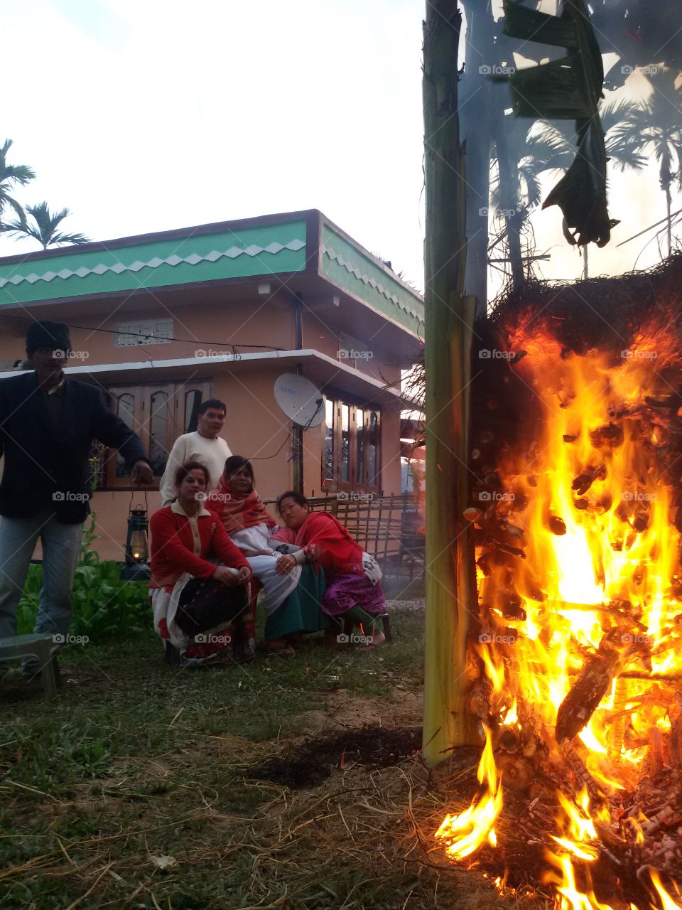 Fire and family on Assamese Festival Maagh bihu..  in front of Mezi