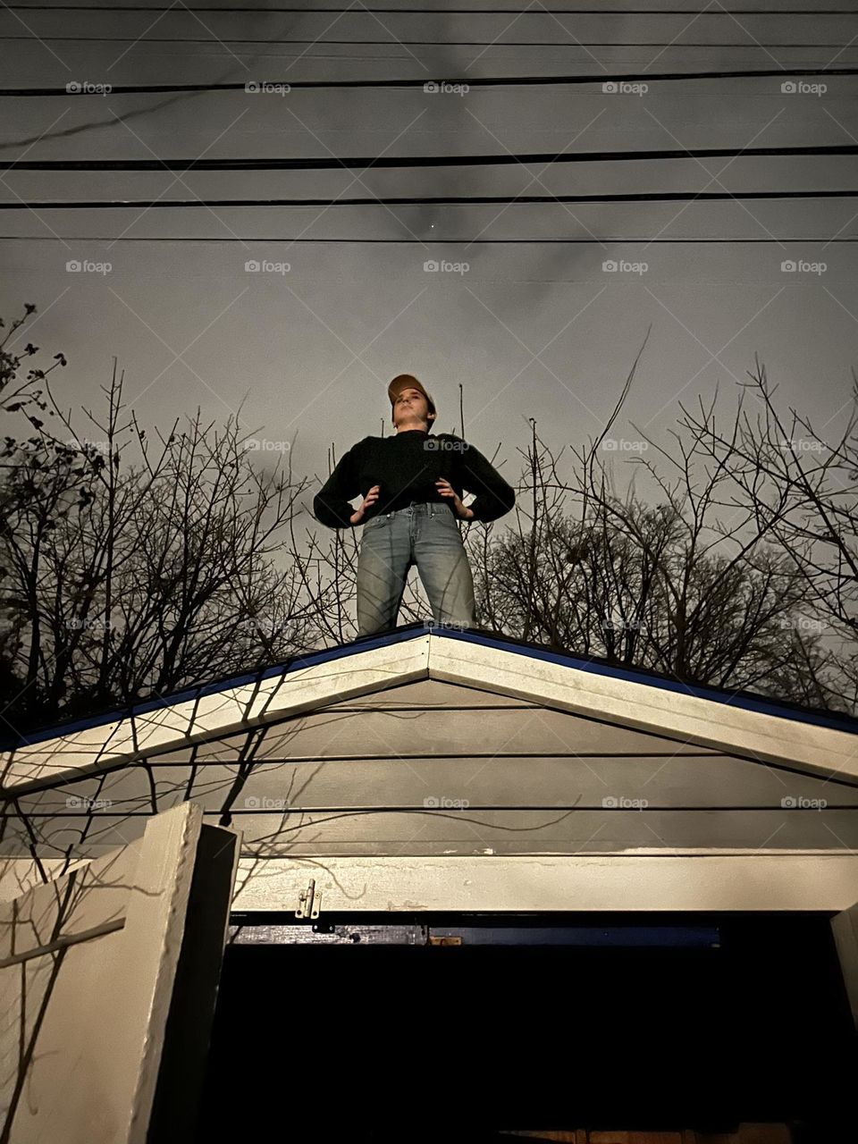 The stance of a proud young man, who just conquered a climb!