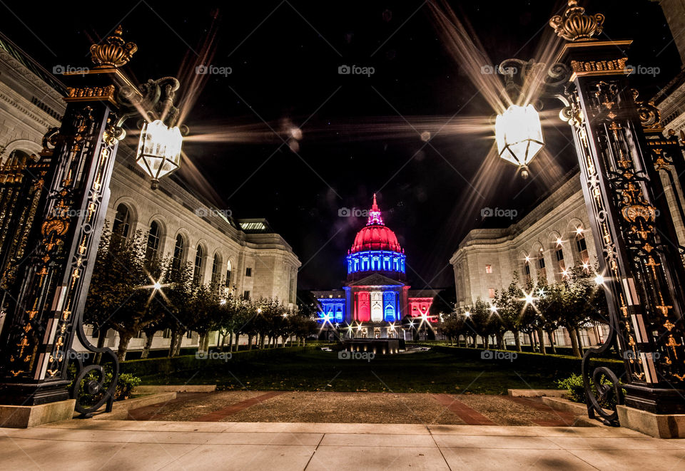 City Hall in SF lights up for the flags of America. The lighting in this city is amazing. The bay bridge, the civic center, city hall, half the skyscrapers light up for other countries struggling, for everyone that needs a smile that night, etc! 