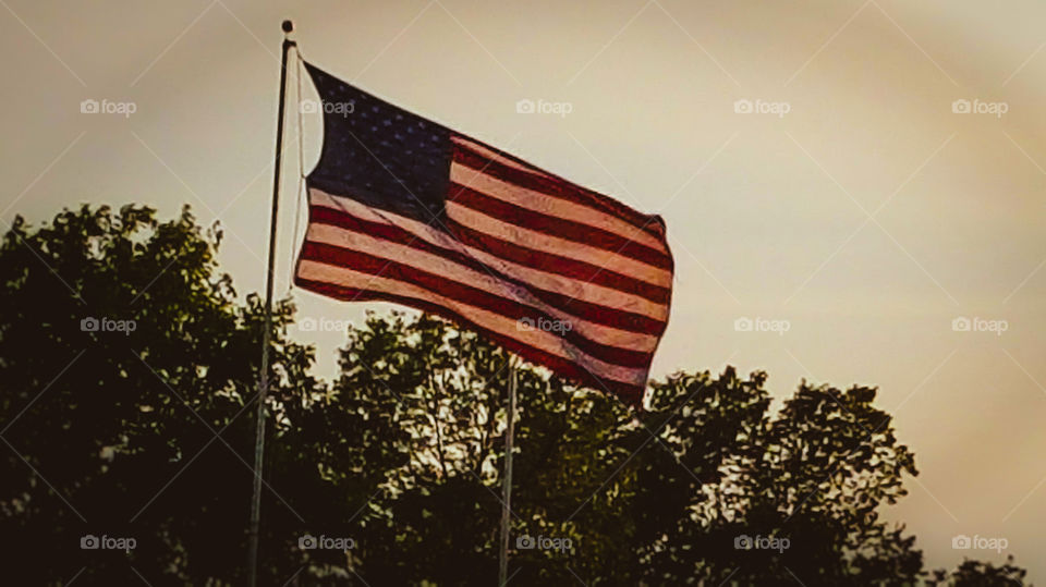 American flag at a football game