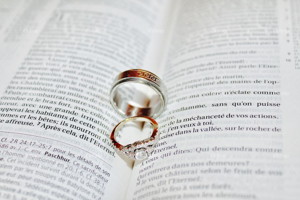 These are our gorgeous wedding rings on the holy scriptures 