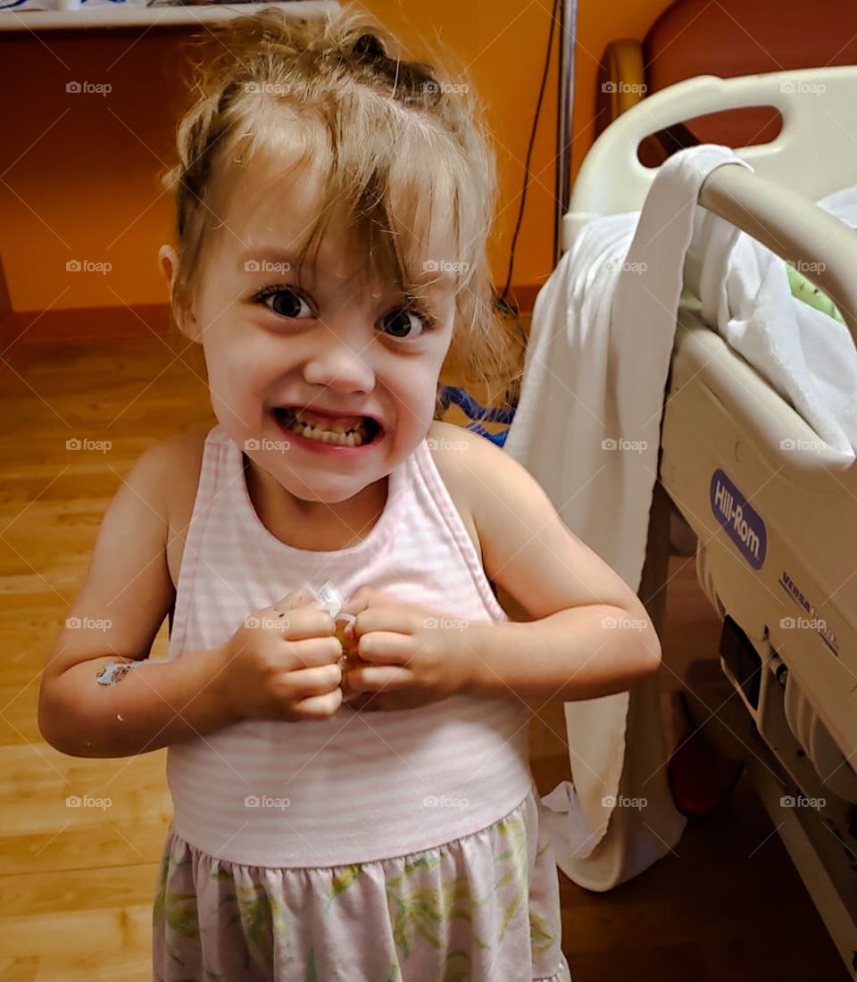 A little girl is so excited to learn she is going home from the hospital. 