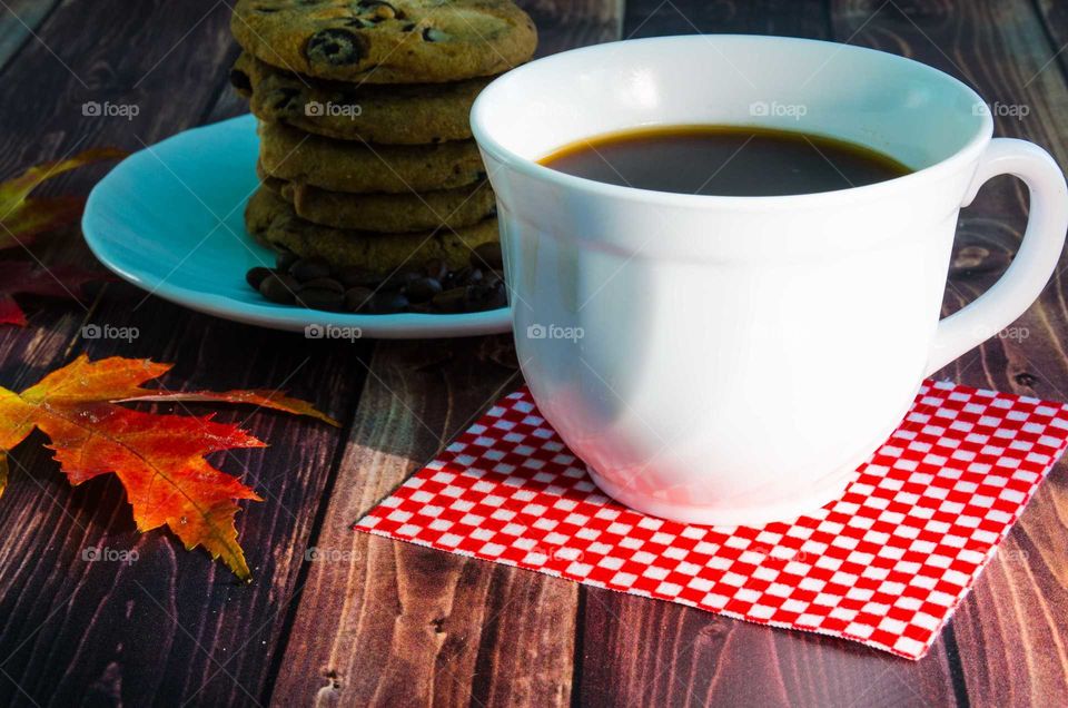 coffee been still life on wooden background