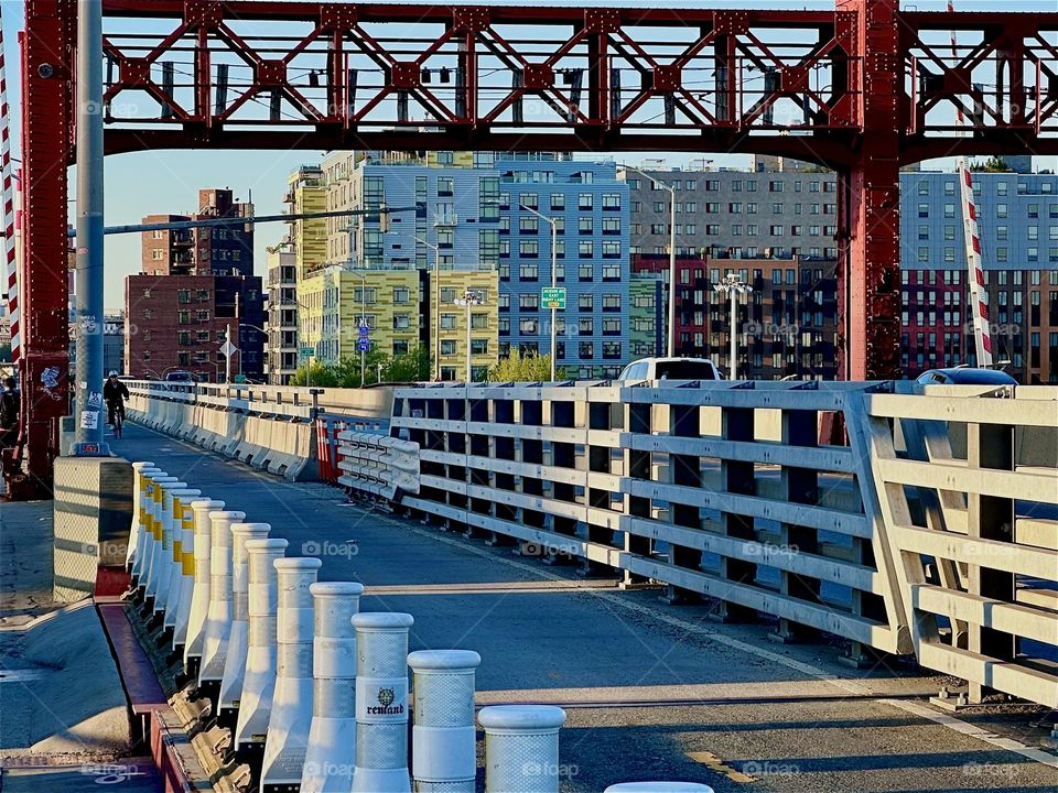 This is the “Pulaski Bridge” at “Newtown Creek” that connects “Greenpoint”, Bklyn to LIC, the direction we are facing. Albeit the industrial style patterns evolve by the incoming sun, shadows cast as well as ornate detail. 2024 Hypnotic Productions