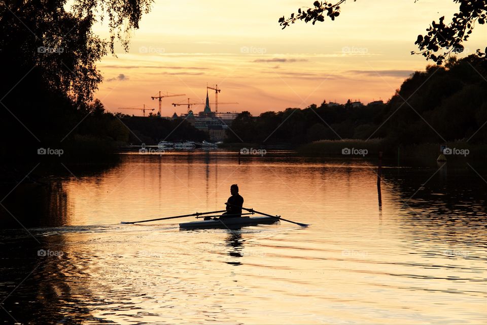 Canoeist in the sunset . Canoeist in the sunset 